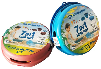 Set de jouets de sable 7-en-1 Schildkröt, version bleue et rose – vue du seau plié dans son emballage où il est indiqué 7 in1 sand toys 