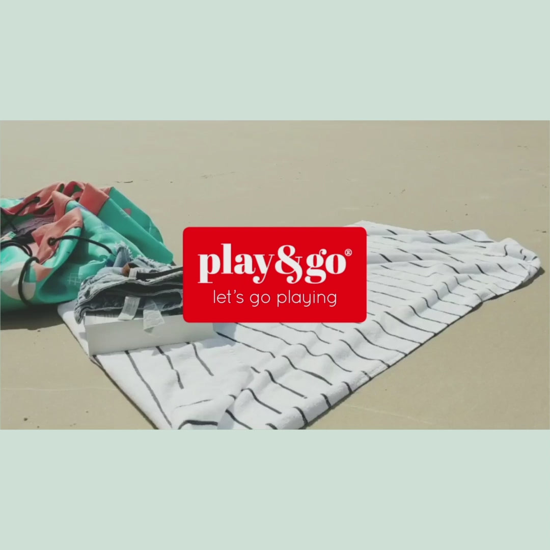 Vidéo mettant en scène le tapis de jeu à la plage